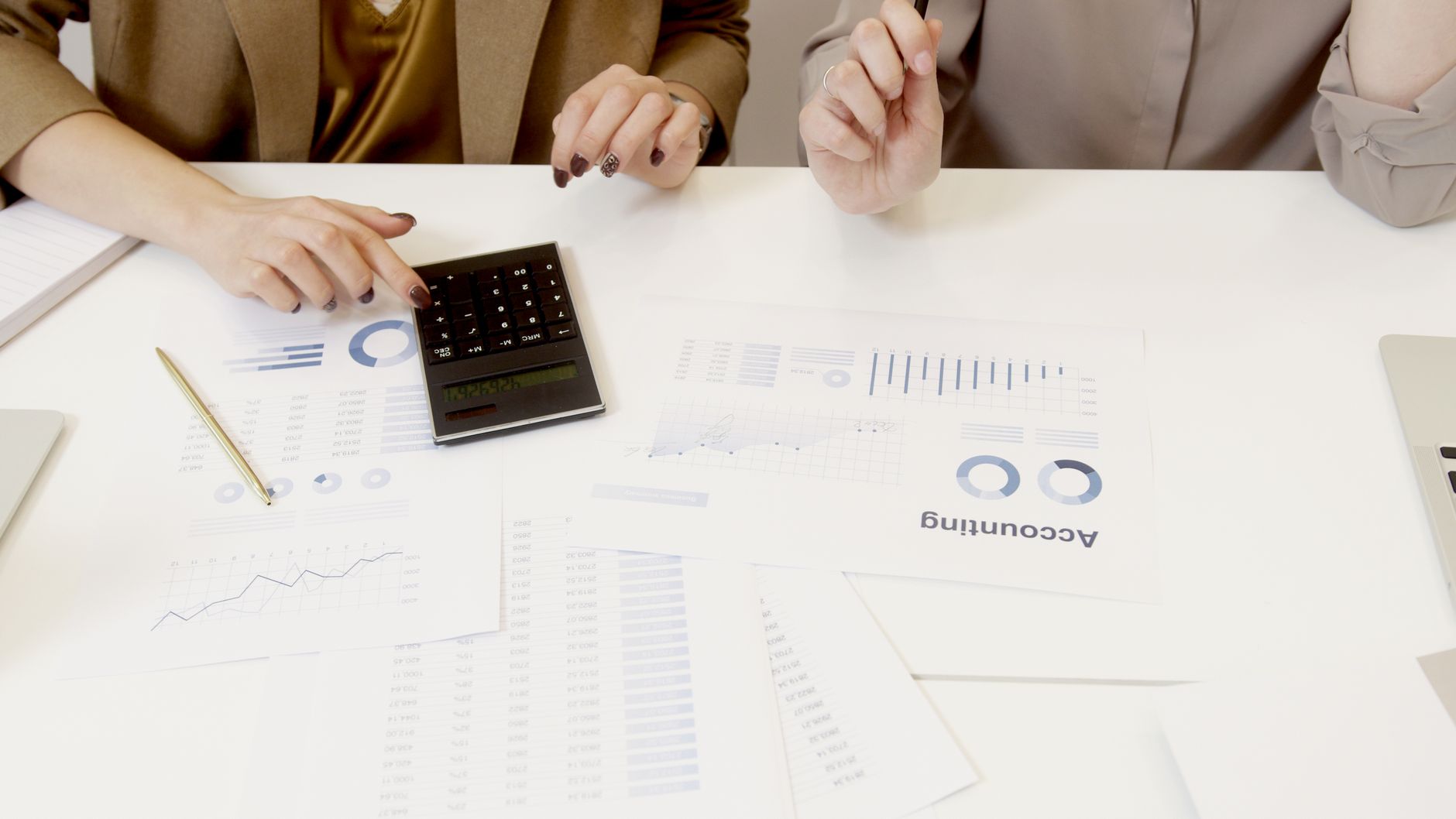 Financial advisor reviewing insurance exchange paperwork
